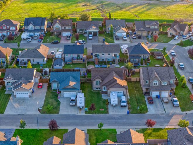 Houses line a street in a Fort St. John neighbourhood.